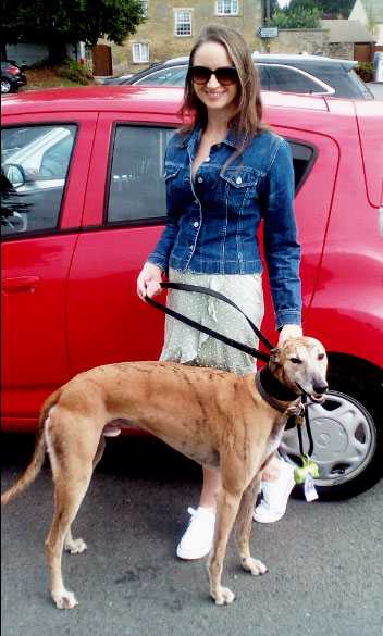 Photo of Jade Brooks and greyhound. Jade is a dog trainer based in Cardiff, Wales, UK.